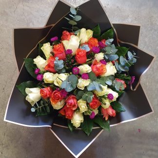 Mixed roses in beautiful black paper